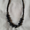 Collier avec perles noires